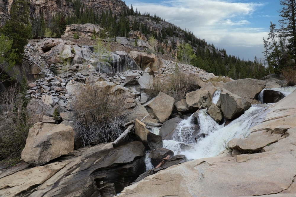 A,Rushing,Waterfall,Through,Craggy,Rocks,On,The,Grottos,Trail